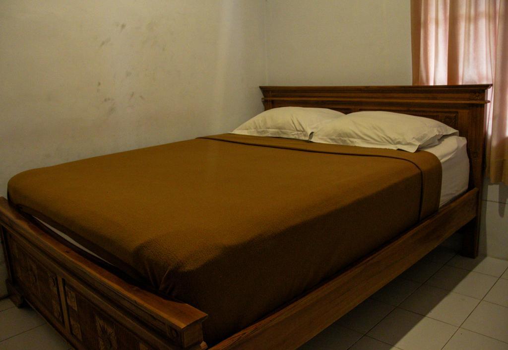Nyoman Guesthouse Canggu Habitación foto